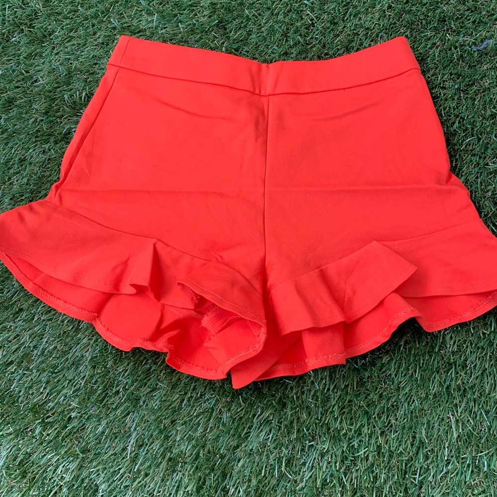 orange shorts by zara